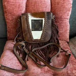 Boutique fringe crossbody with Louis Vuitton Logo